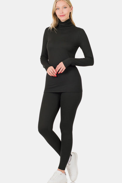 Zenana full-size turtleneck top and leggings lounge set in black, featuring a slim-fit design with long sleeves and ankle-length leggings.