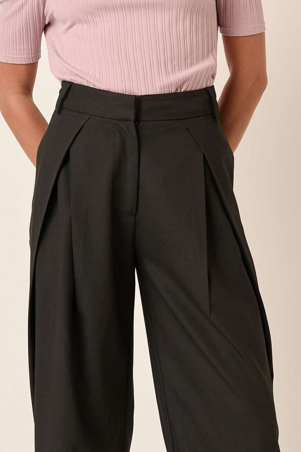 Detailed front view of Mittoshop deep pleated high waisted wide leg pants, highlighting pleats and high-waisted design.