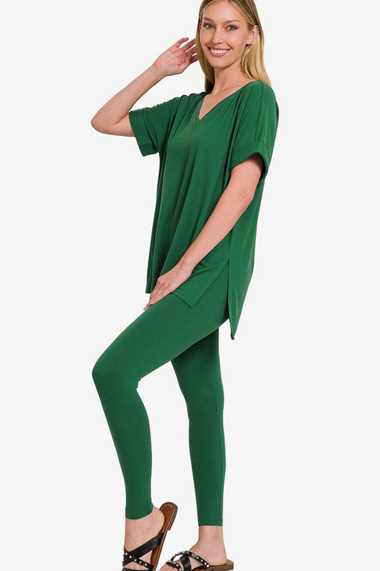 Zenana V-neck rolled short sleeve t-shirt and leggings lounge set in green, featuring a relaxed fit top with side slits and snug leggings.