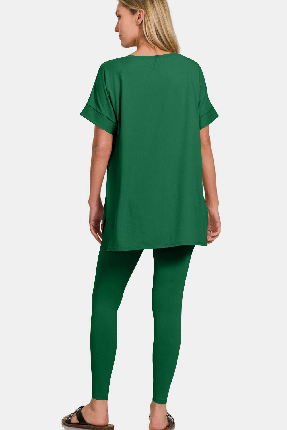 Back view of Zenana V-neck rolled short sleeve t-shirt and leggings lounge set in green, showcasing the loose-fit top and fitted leggings.